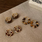 Boucle_d_oreilles_marron_or_boule_et_deux_autres_collections