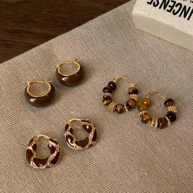 Boucle_d_oreilles_marron_or_boule_et_deux_autres_collections