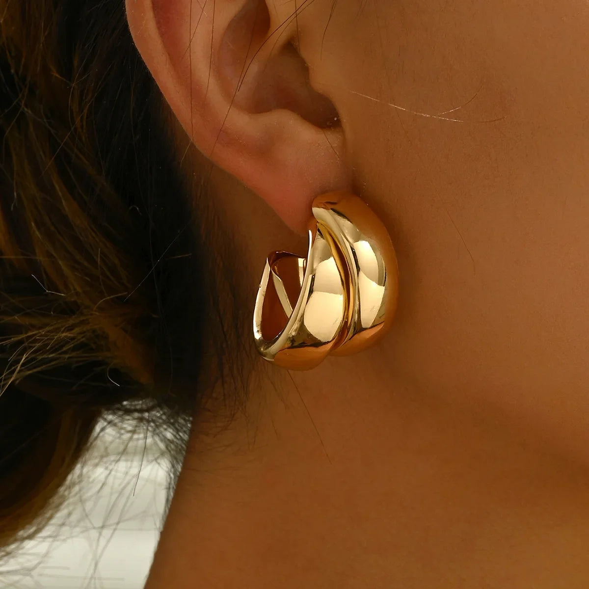 Boucles d’Oreilles Torsadées – Or & Argent