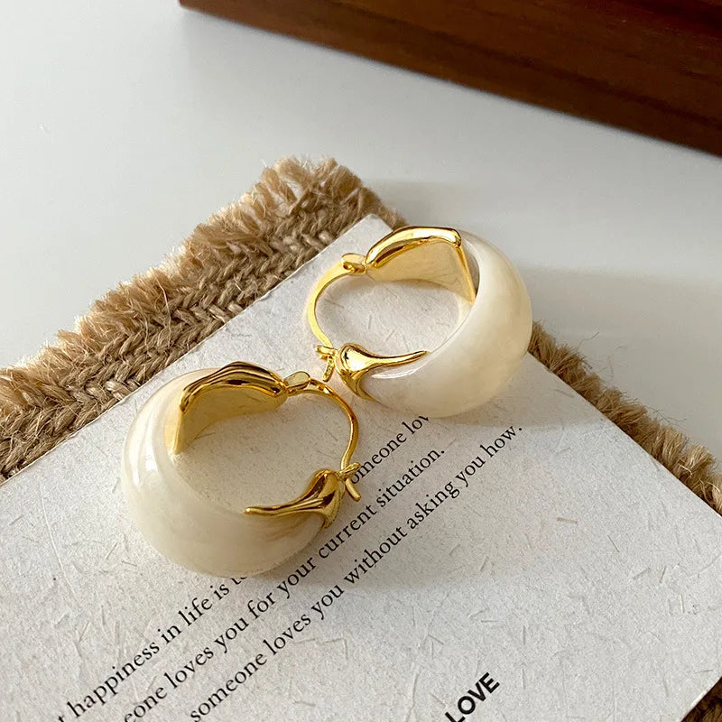 Boucles_d_oreilles_blanc_or_argent