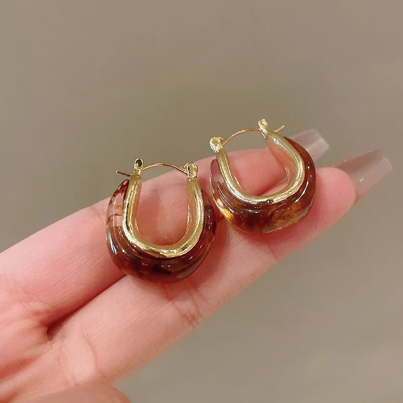 Boucles_d_oreilles_couleurs_or_marron_rond