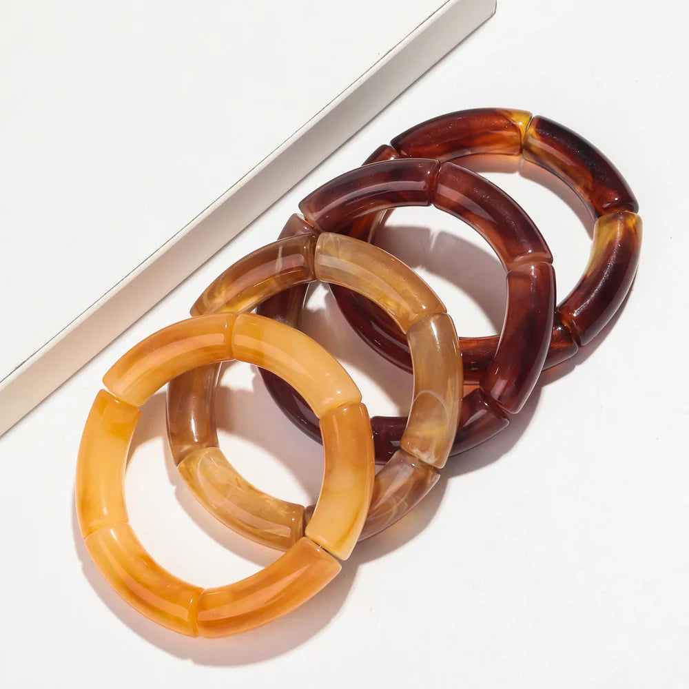 Boucles_d_oreilles_marron_ambre_par_deux_2