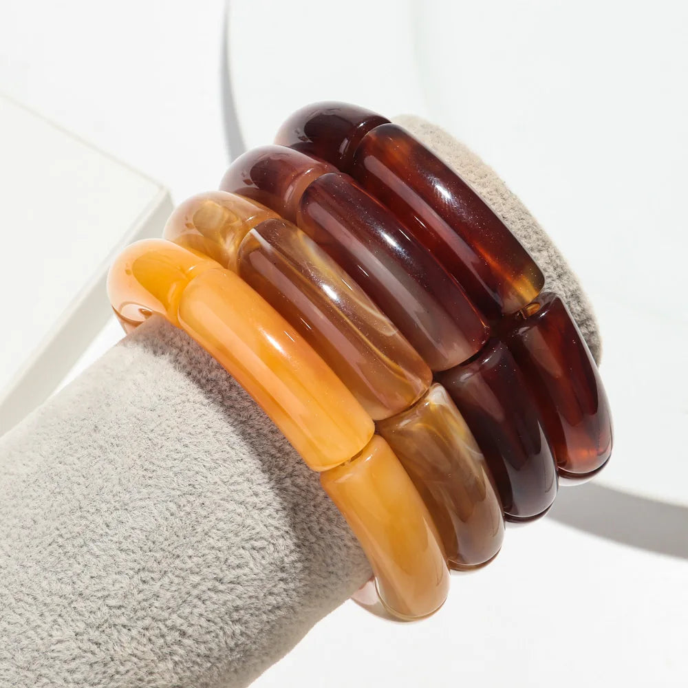Boucles_d_oreilles_marron_ambre_par_deux_3