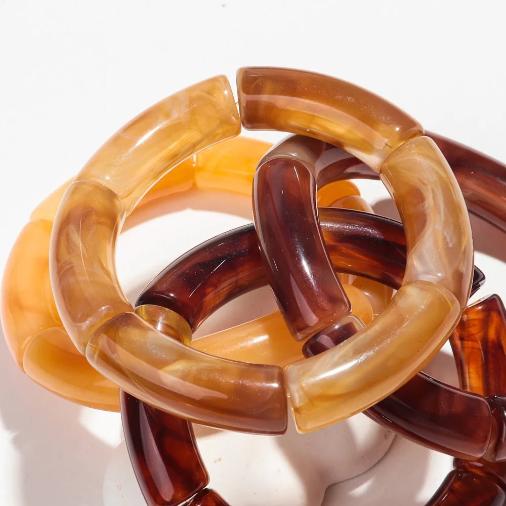 Boucles_d_oreilles_marron_ambre_par_deux_4