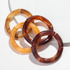 Boucles_d_oreilles_marron_ambre_par_deux_5
