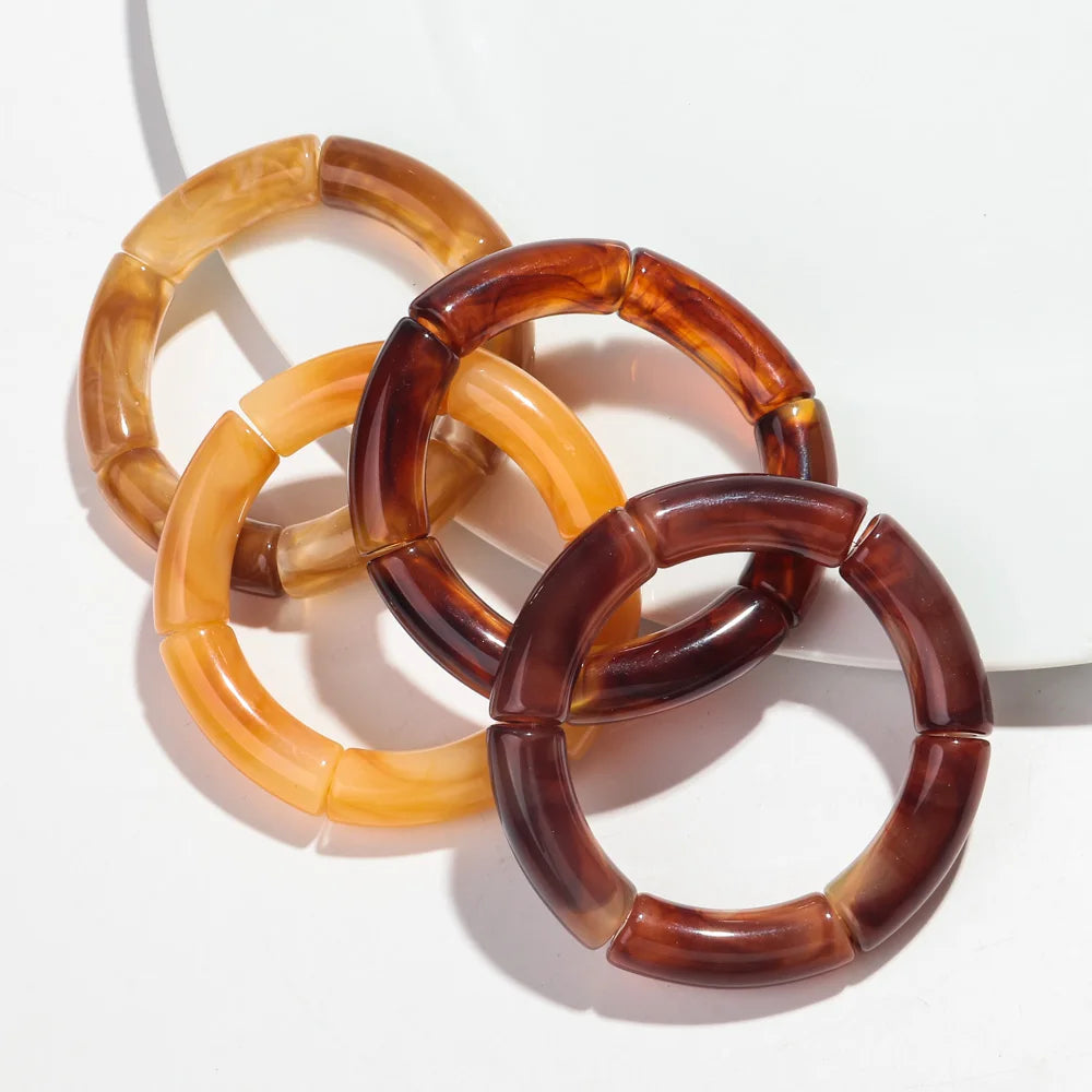 Boucles_d_oreilles_marron_ambre_par_deux_5