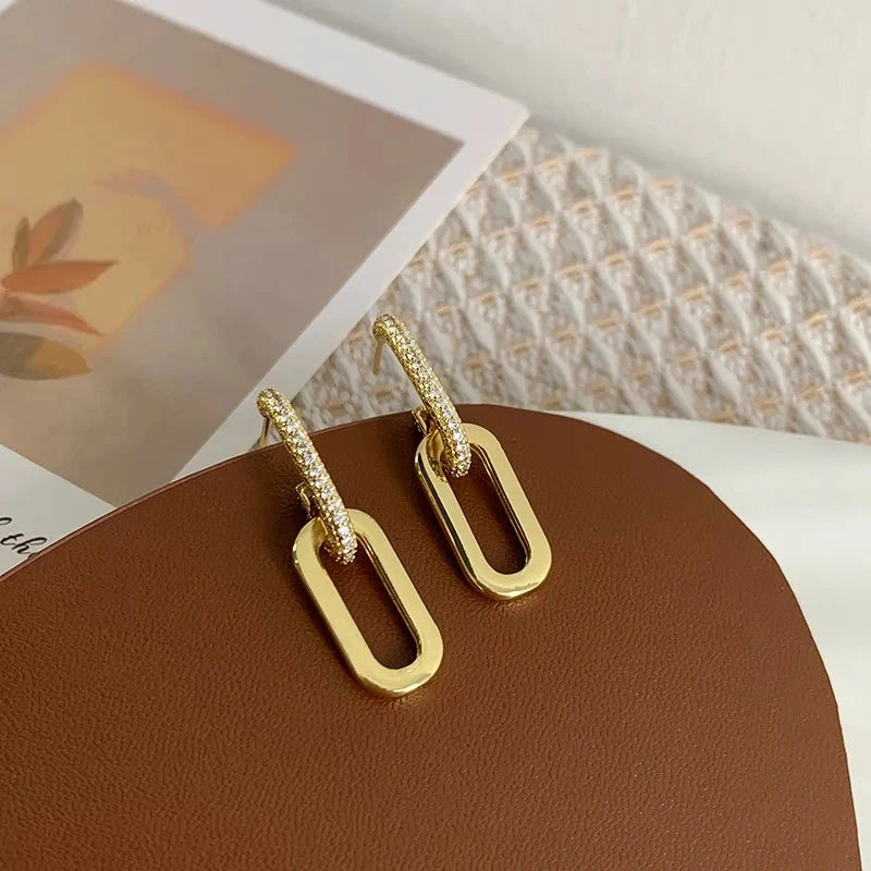 Boucles_d_oreilles_or_deux_boucles_d_monstration