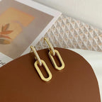Boucles_d_oreilles_or_deux_boucles_d_monstration
