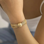 Bracelet_en_or_torsad_port
