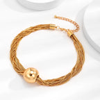 Bracelet_en_or_torsad_vue_de_haut