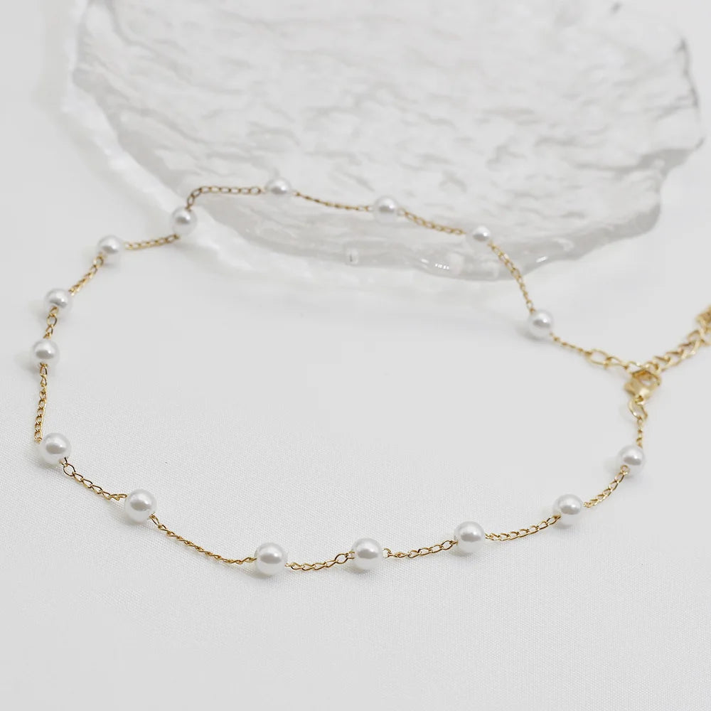 Collier minimaliste perles blanches – Accessoire élégant pour femme
