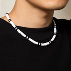 Collier_perle_blanche_noir_homme_style_2