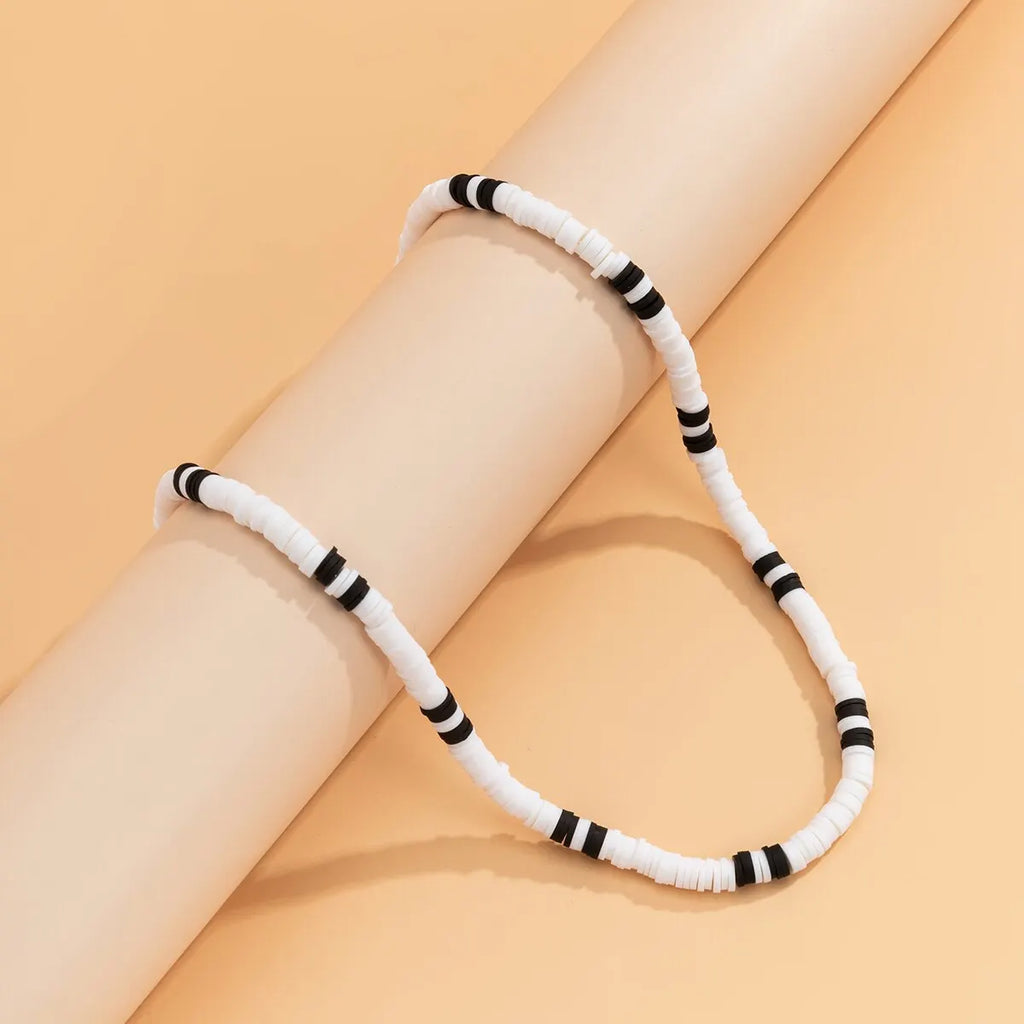 Collier_perle_blanche_noir_homme_style_4