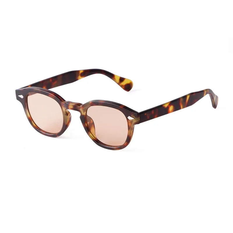 Lunettes rétro avec monture moderne, verres ronds et style intemporel.